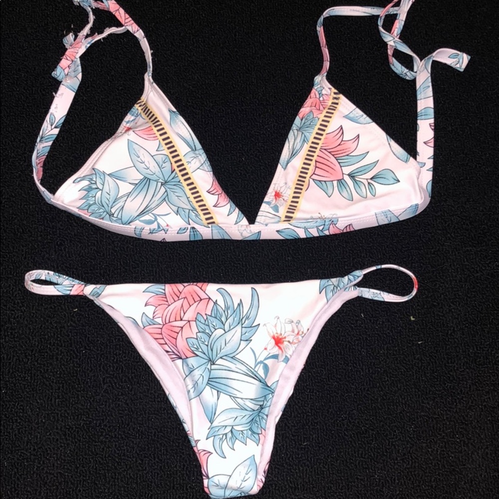 Only been worn once, white pink & blue bikini